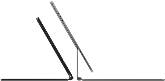 Two iPad Pro devices attached to Magic Keyboard, side exterior, thin profile, space black colour with speakers and USB-C port, tilted half open, silver colour, open, tilted back showing the keyboard’s floating cantilever design, speakers and microphone